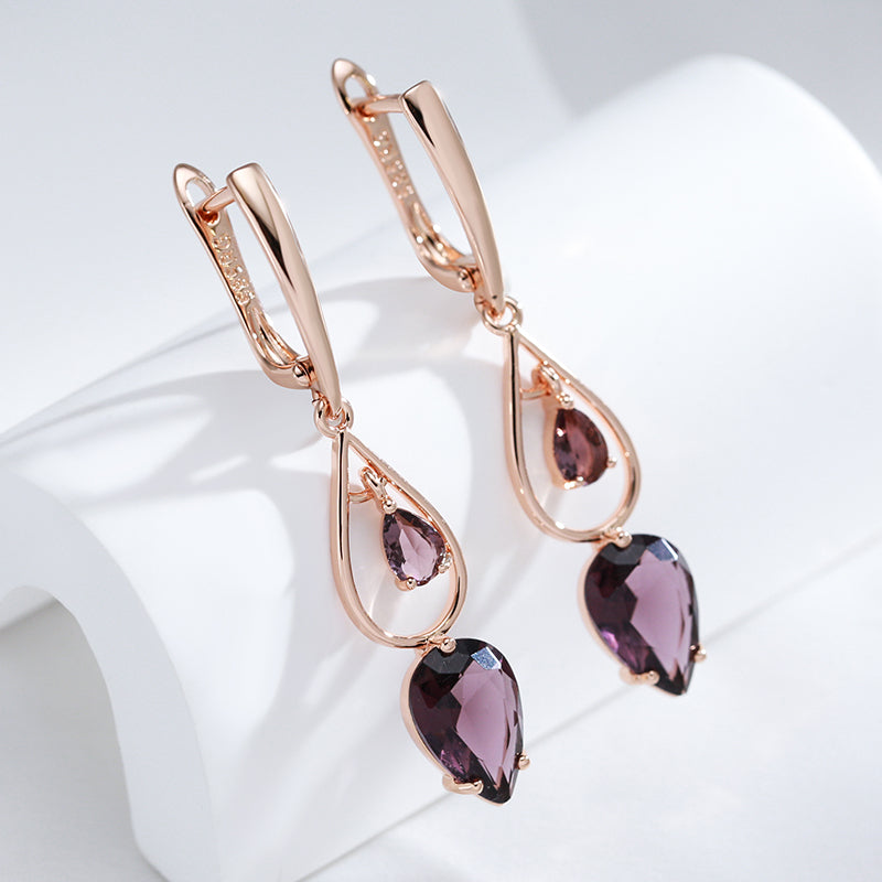 Boucles d'oreilles élégantes en goutte d'eau mauve et cristal doré